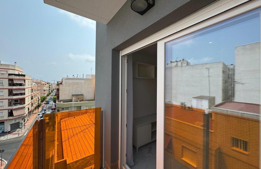 can foreigners buy property in spain new apartment torrevieja rooftop barbecue terrace communal area