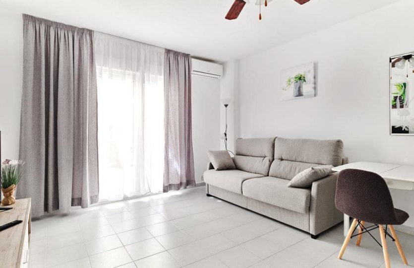 Apartment Torrevieja close to the sea bright living room with terrace access and natural light