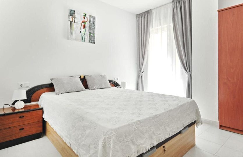 Apartment Torrevieja close to the sea bedroom with double bed bright modern interior